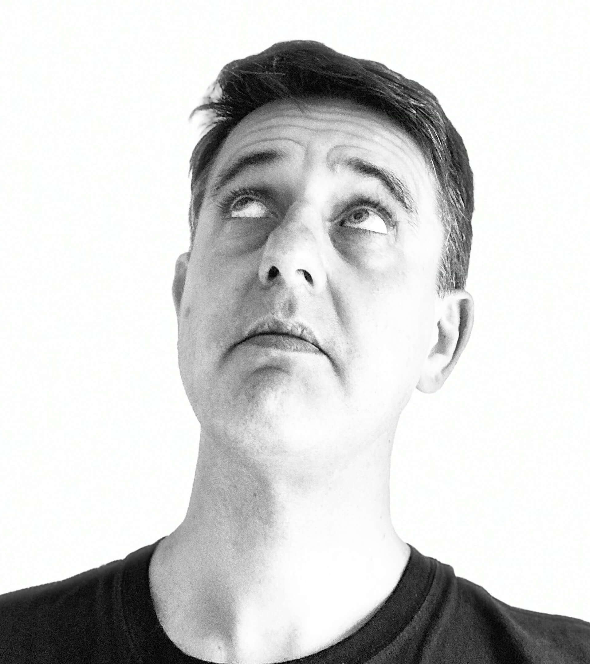 A portrait photo of Adam Todd