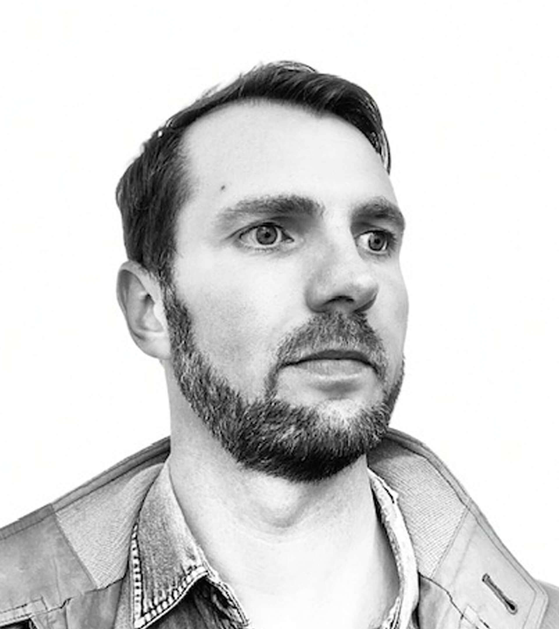 A portrait photo of Tom Rowlands